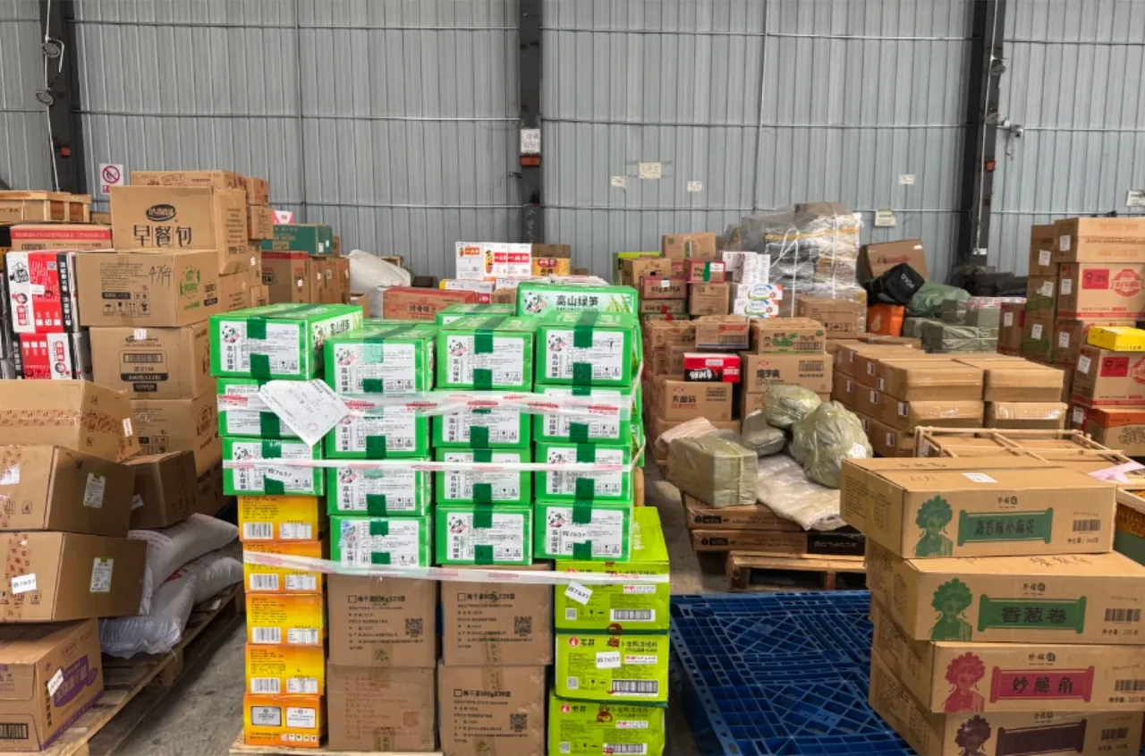 Cartons staged in a warehouse receiving area